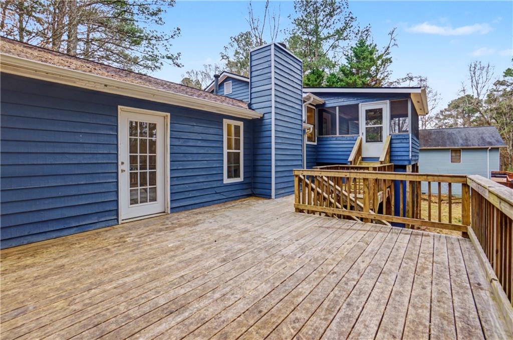 520 Victoria Road Woodstock, GA 30189 - Photo 39 of 42 a view of a house with wooden deck
