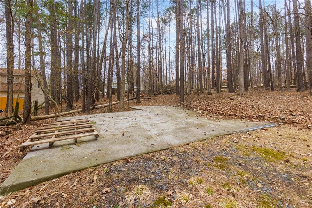 520 Victoria Road Woodstock, GA 30189 - Photo 42 of 42 a view of outdoor space with deck and yard