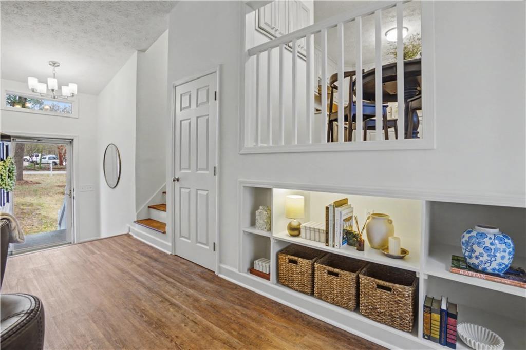 520 Victoria Road Woodstock, GA 30189 - Photo 9 of 42 a view of an entryway with wooden floor