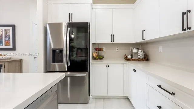a spacious bedroom with a bed and window