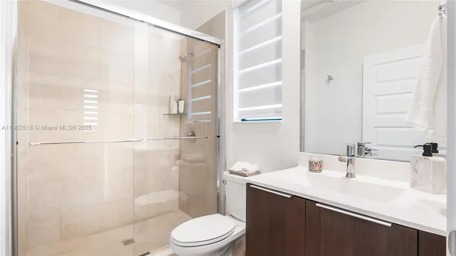 a bedroom with a bed and a table