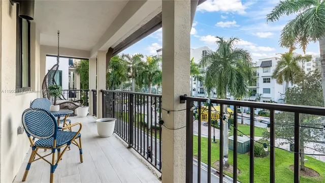 a bedroom with a bed and a table