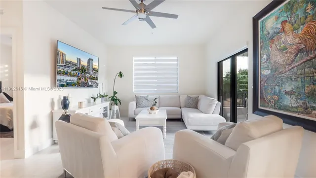 a bedroom with bed and window