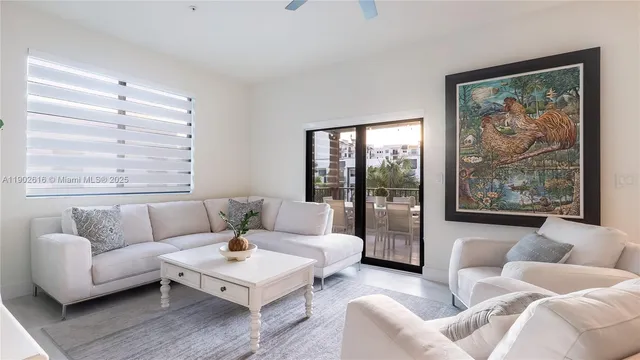 a view of a house with a swimming pool and sitting area