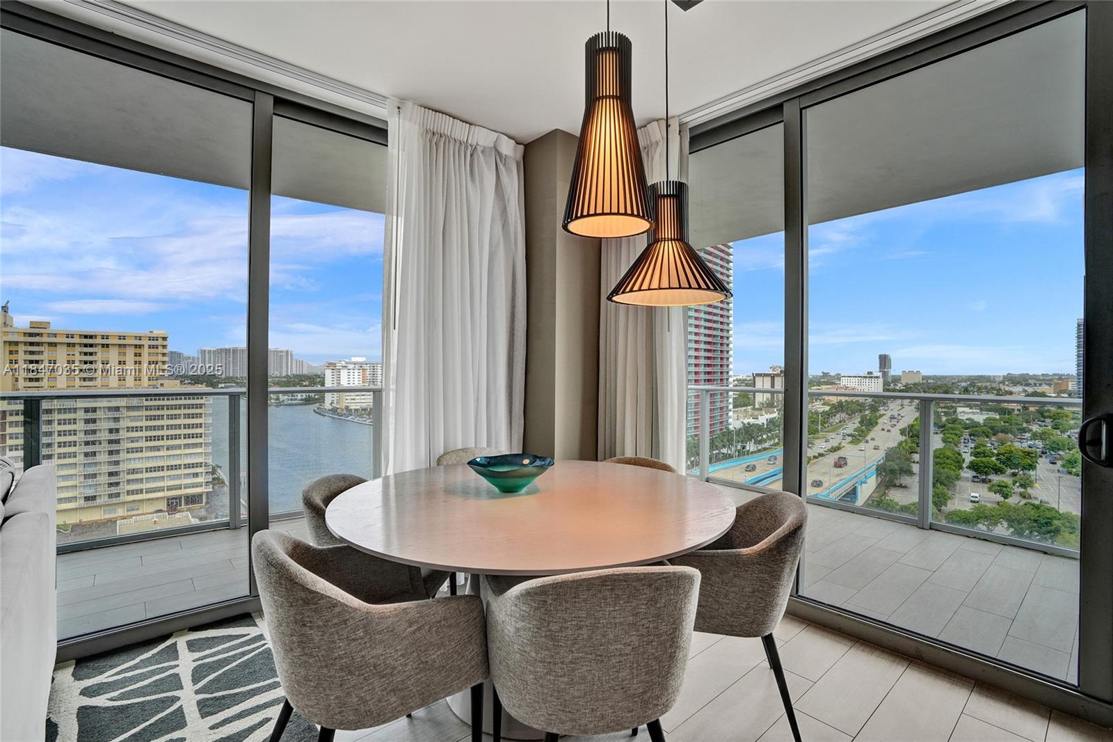 4010 South Ocean Drive, Unit R908 Hollywood, FL 33019 - Photo 2 of 53 a view of a dining room with furniture window and outside view