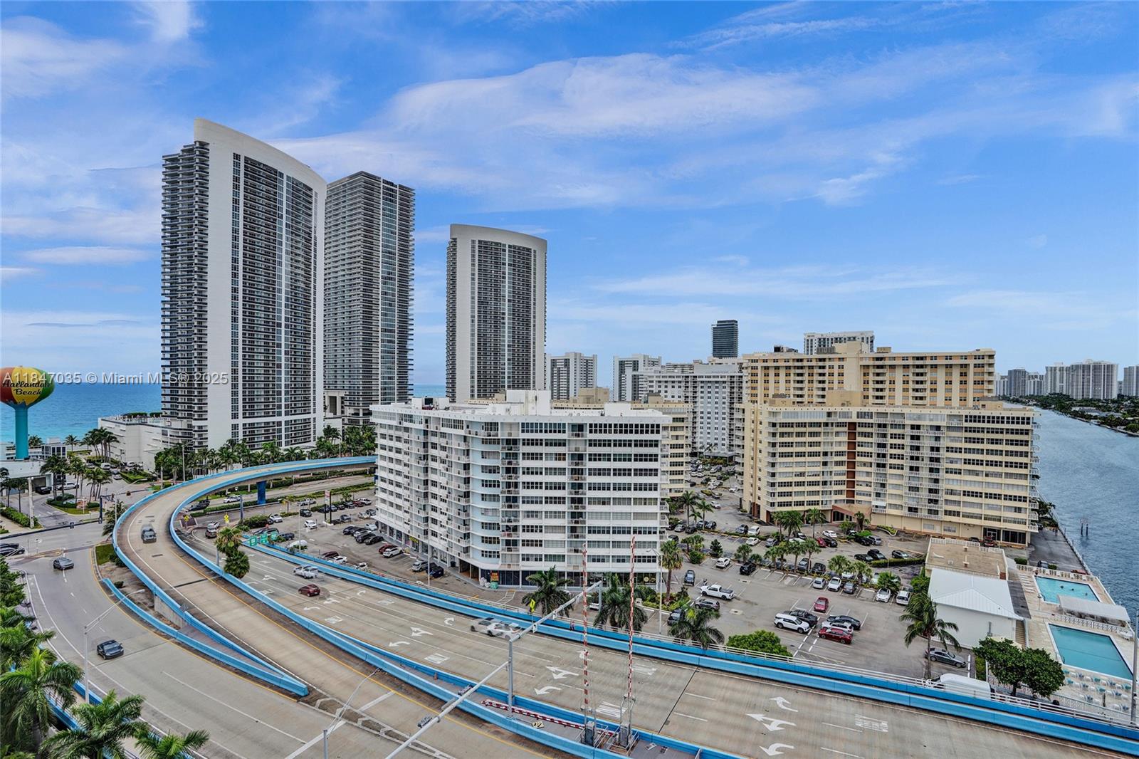 4010 South Ocean Drive, Unit R908 Hollywood, FL 33019 - Photo 26 of 53 a view of building with yard