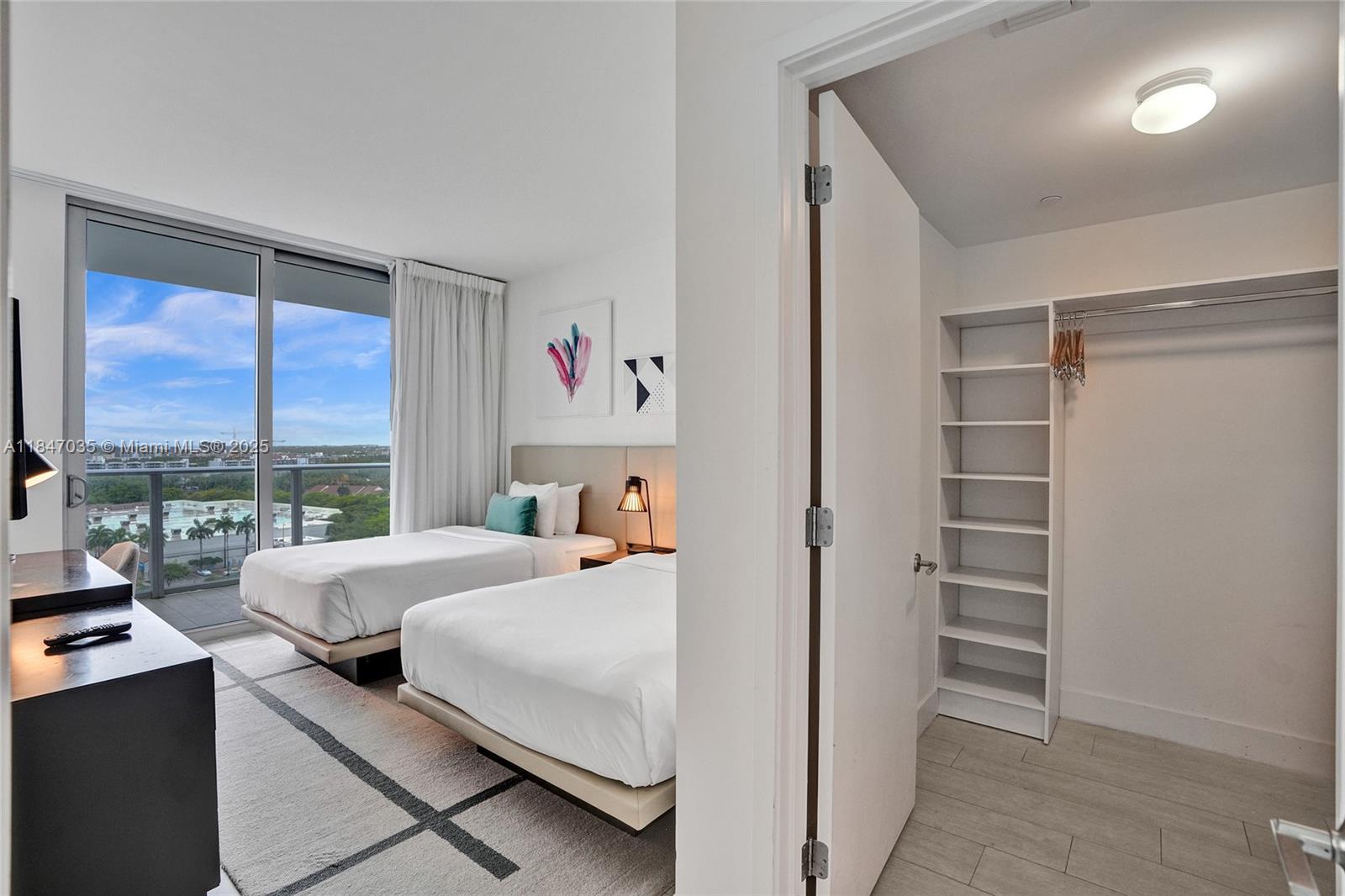 4010 South Ocean Drive, Unit R908 Hollywood, FL 33019 - Photo 33 of 53 a bedroom with a bed and a window