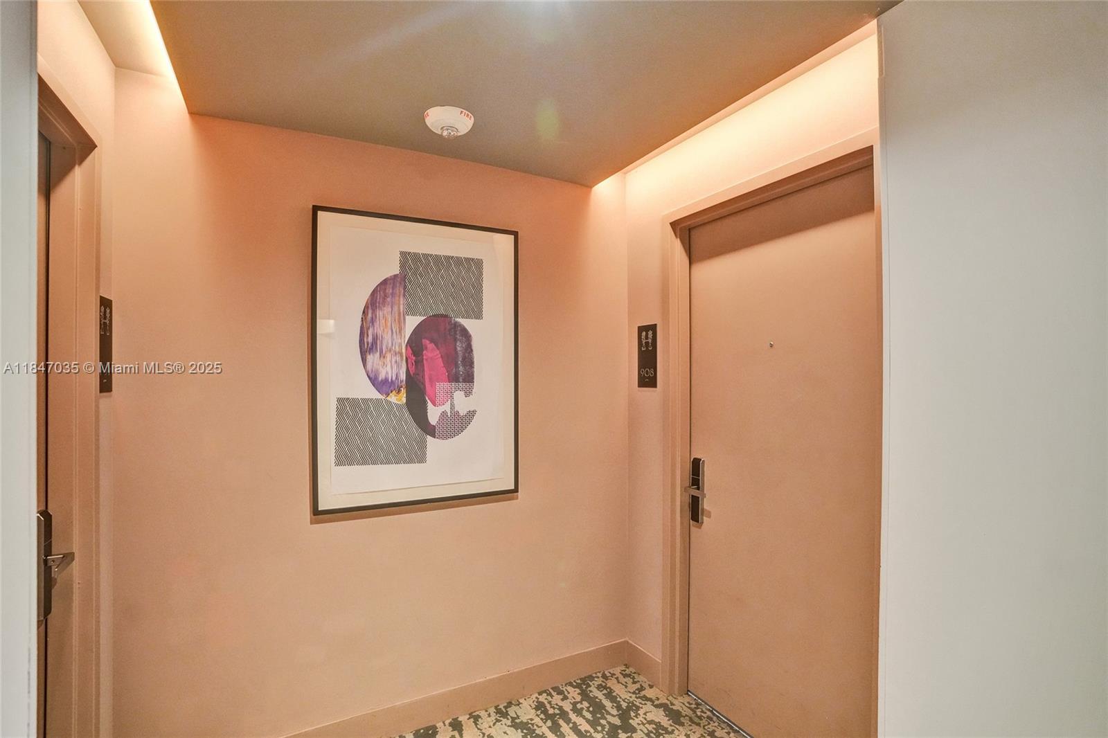 4010 South Ocean Drive, Unit R908 Hollywood, FL 33019 - Photo 44 of 53 a view of a hallway with a elevator