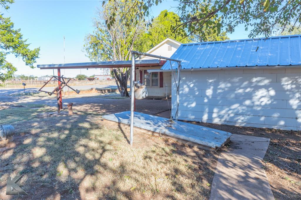 405 South Hinton Street Benjamin, TX 79505 - Photo 22 of 40 View of front facade with a metal roof