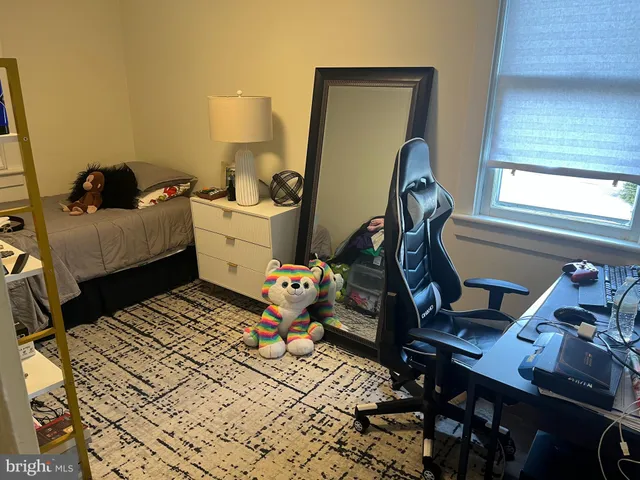 a room with furniture and a window