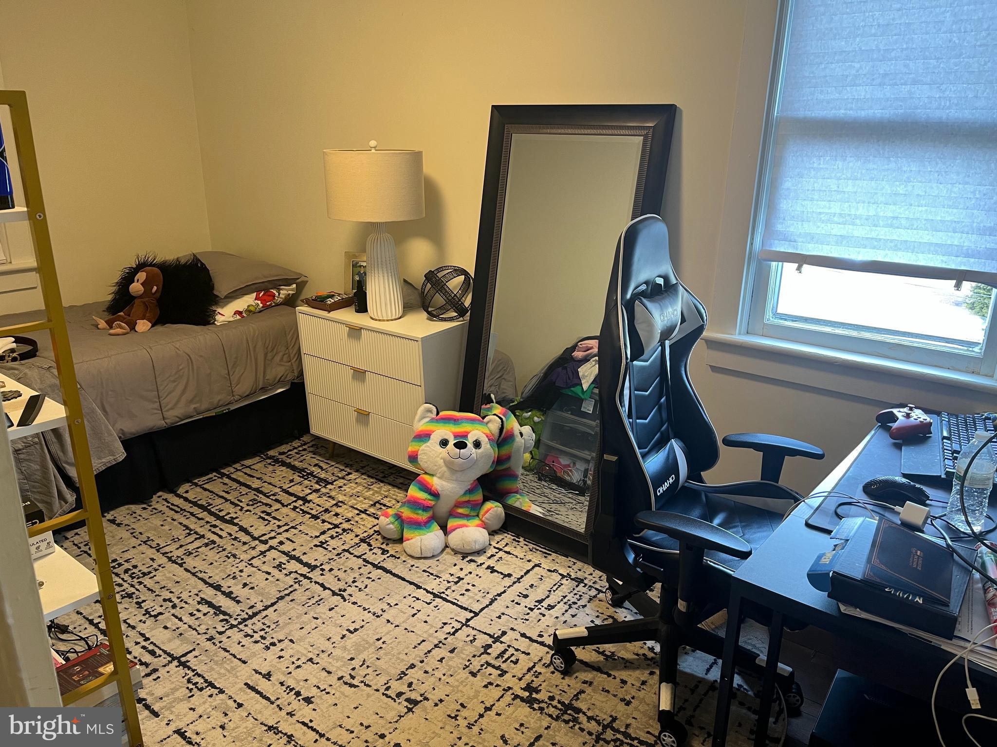 38 South Main Street, Unit 3 Mullica Hill, NJ 08062 - Photo 3 of 10 a room with furniture and a window