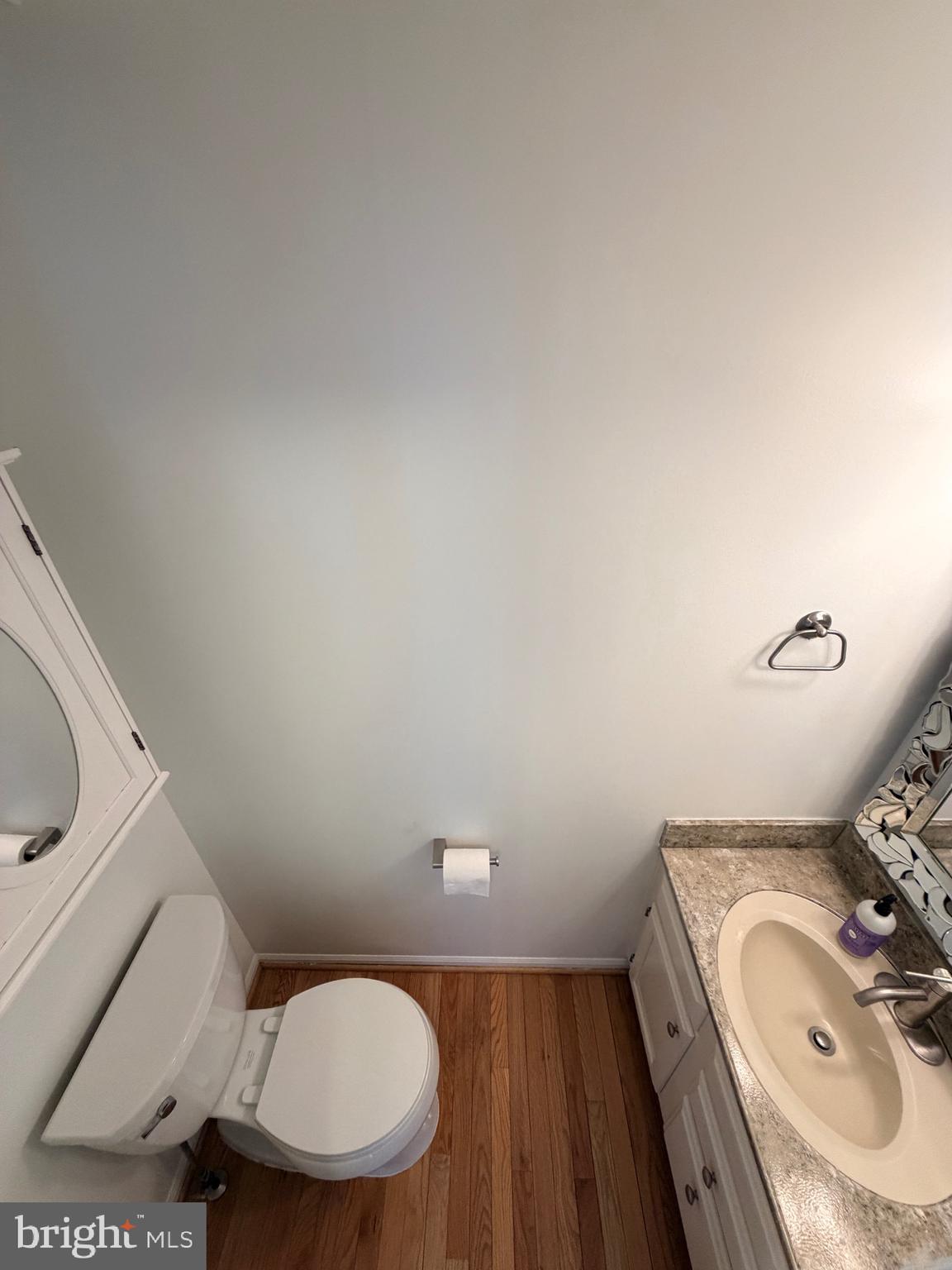 13953 Winding Ridge Lane Centreville, VA 20121 - Photo 7 of 23 a bathroom with a sink and a toilet