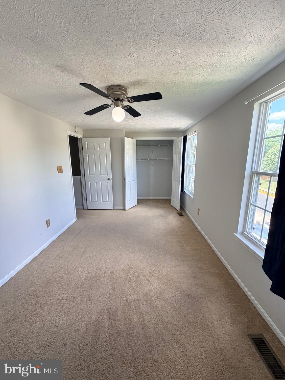 13953 Winding Ridge Lane Centreville, VA 20121 - Photo 9 of 23 a view of an empty room with a window