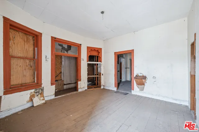 workspace with wooden floor and window