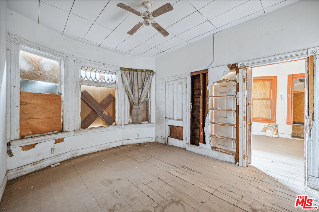 419 Acoma Street Needles, CA 92363 - Photo 23 of 29 workspace with wooden floor and window