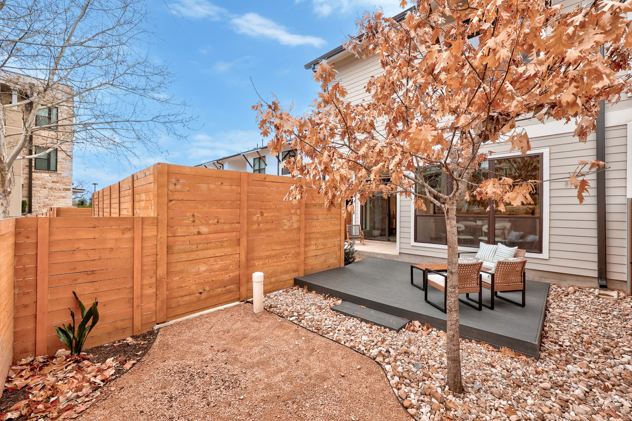 2707 Dulce Lane, Unit 14 Austin, TX 78704 - Photo 27 of 40 a backyard of a house with outdoor seating