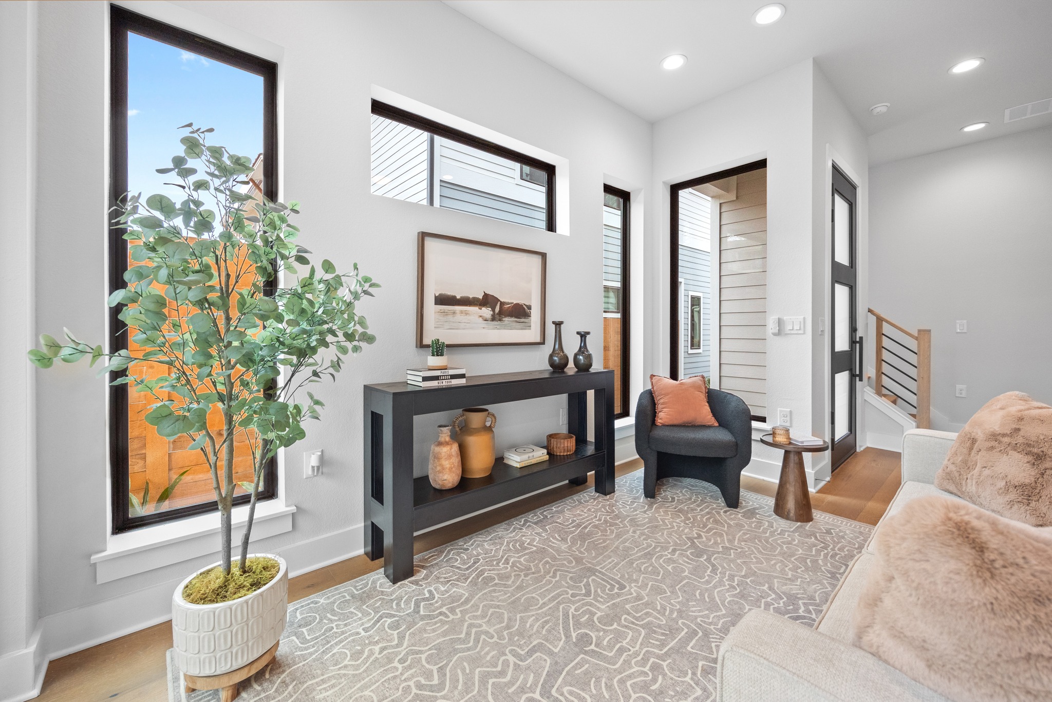 2707 Dulce Lane, Unit 14 Austin, TX 78704 - Photo 5 of 40 a living room with furniture and a fireplace