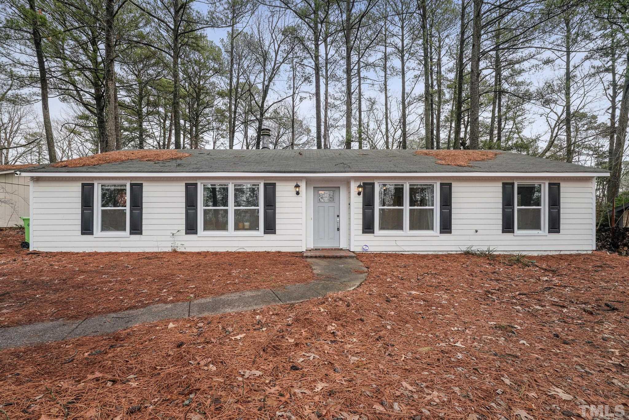 5218 Duraleigh Road Raleigh, NC 27612 - Photo 2 of 27 front view of house with a yard