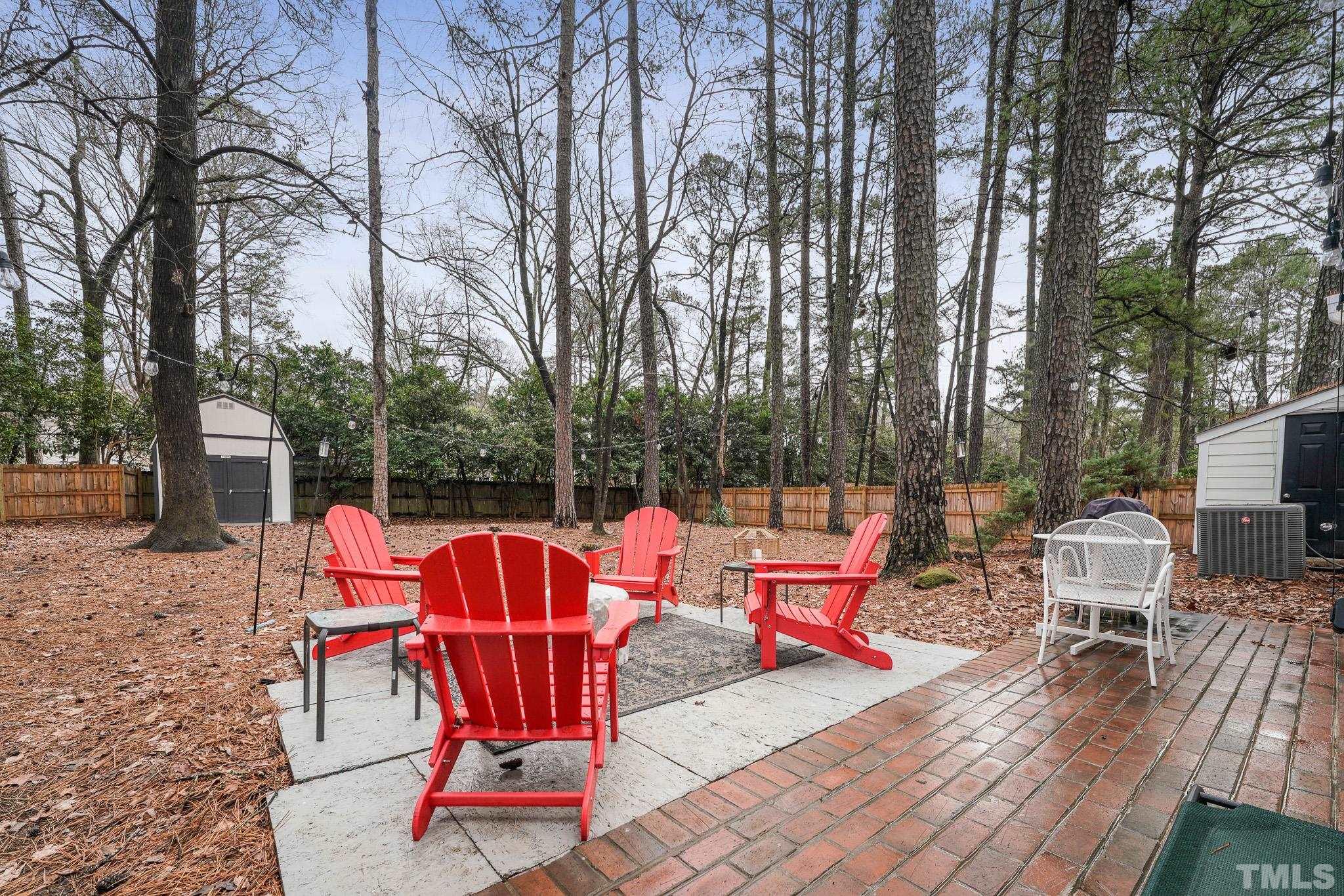 5218 Duraleigh Road Raleigh, NC 27612 - Photo 24 of 27 a sitting area with furniture and wooden floor