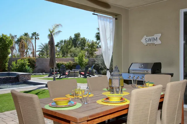 a bathroom with a sink toilet vanity and shower