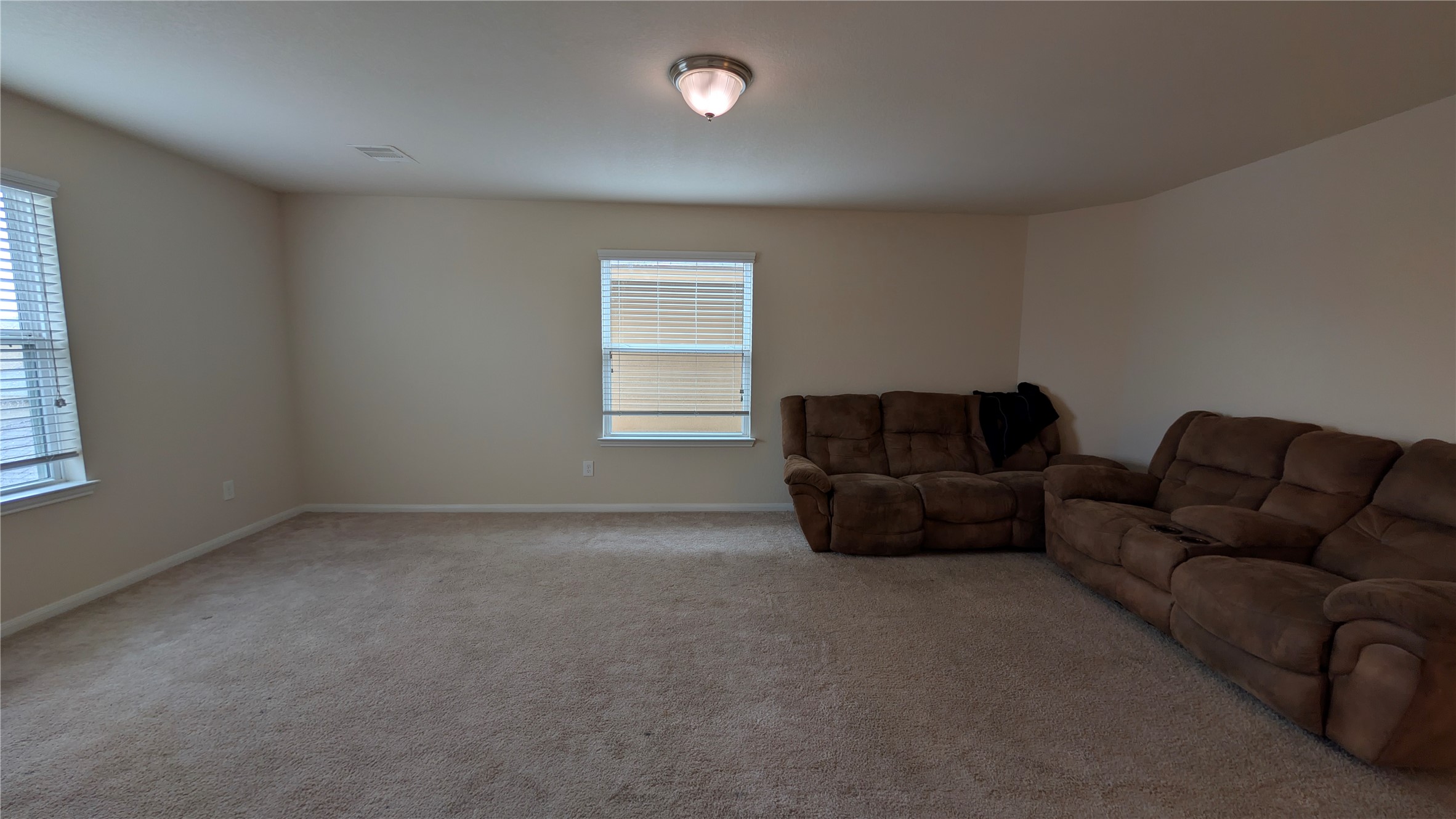 7326 Granite Terrace Lane Houston, TX 77083 - Photo 12 of 39 a living room with furniture and a window