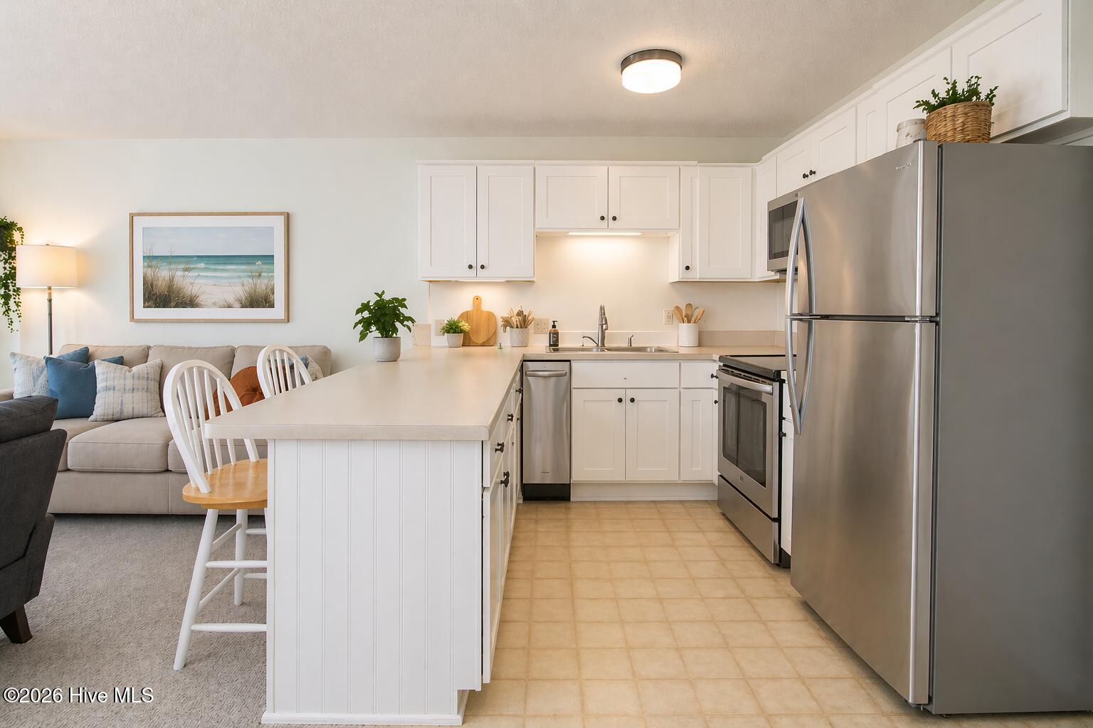 9201 Coast Guard Road, Unit F 210 Emerald Isle, NC 28594 - Photo 12 of 32 Kitchen-staged