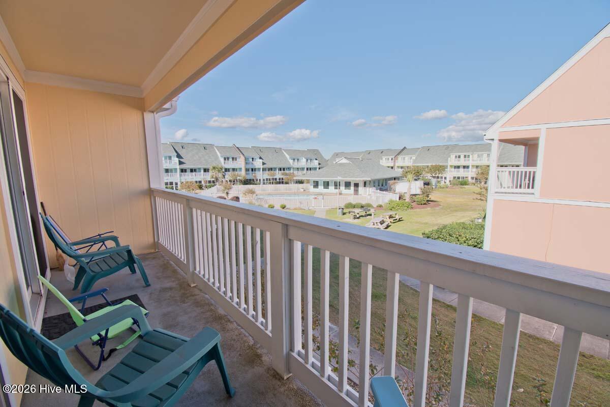 9201 Coast Guard Road, Unit F 210 Emerald Isle, NC 28594 - Photo 17 of 32 Covered deck
