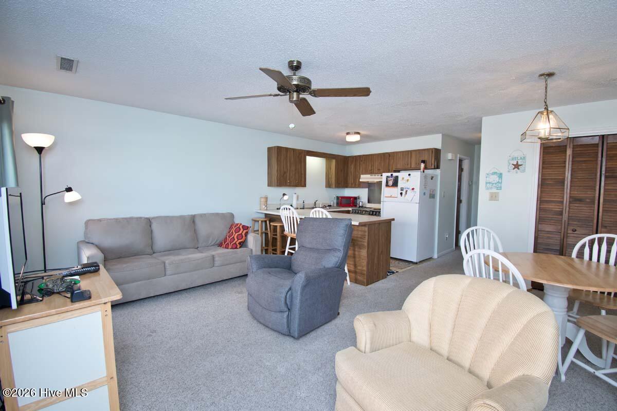 9201 Coast Guard Road, Unit F 210 Emerald Isle, NC 28594 - Photo 2 of 32 Great room