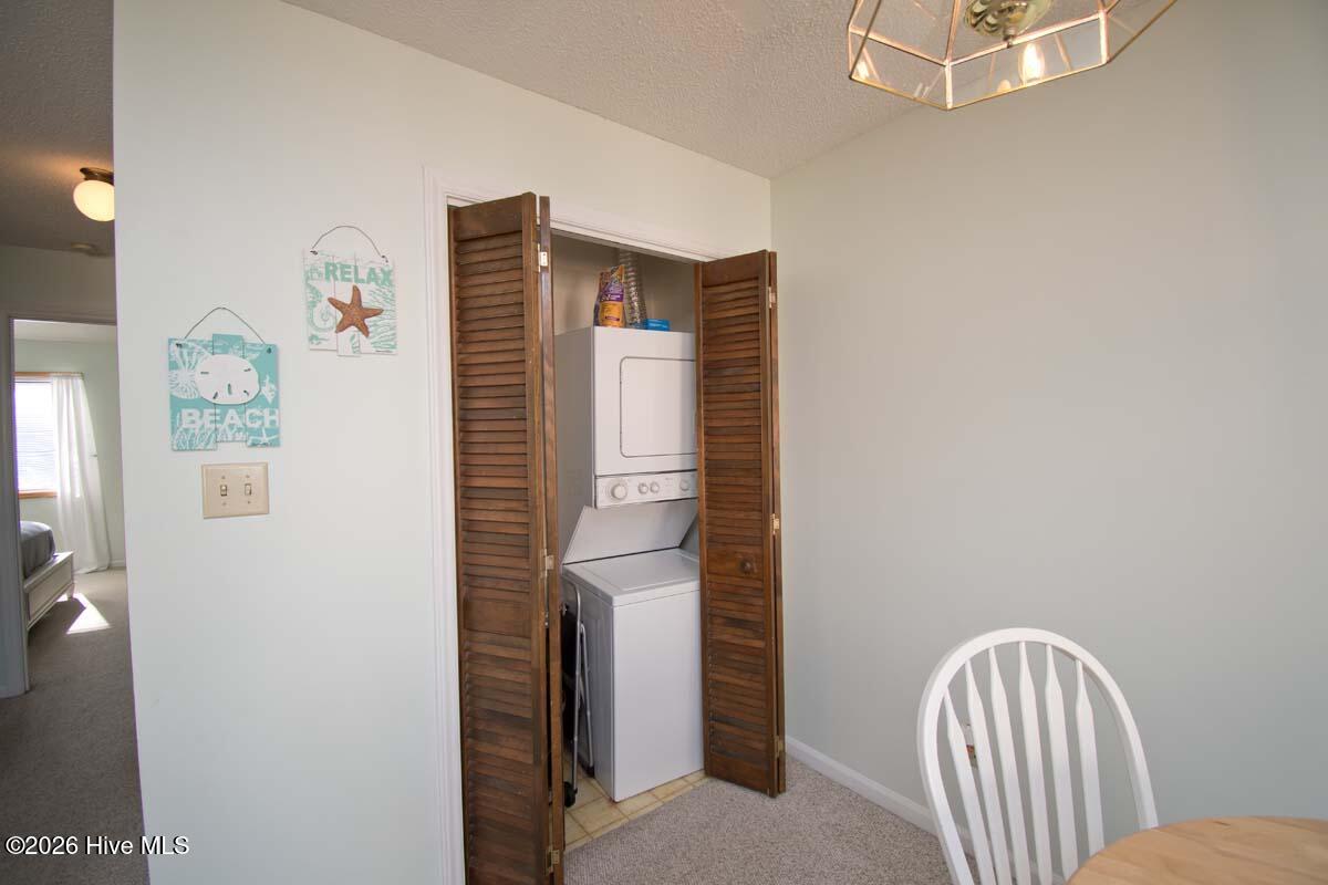 9201 Coast Guard Road, Unit F 210 Emerald Isle, NC 28594 - Photo 21 of 32 Stack washer/dryer