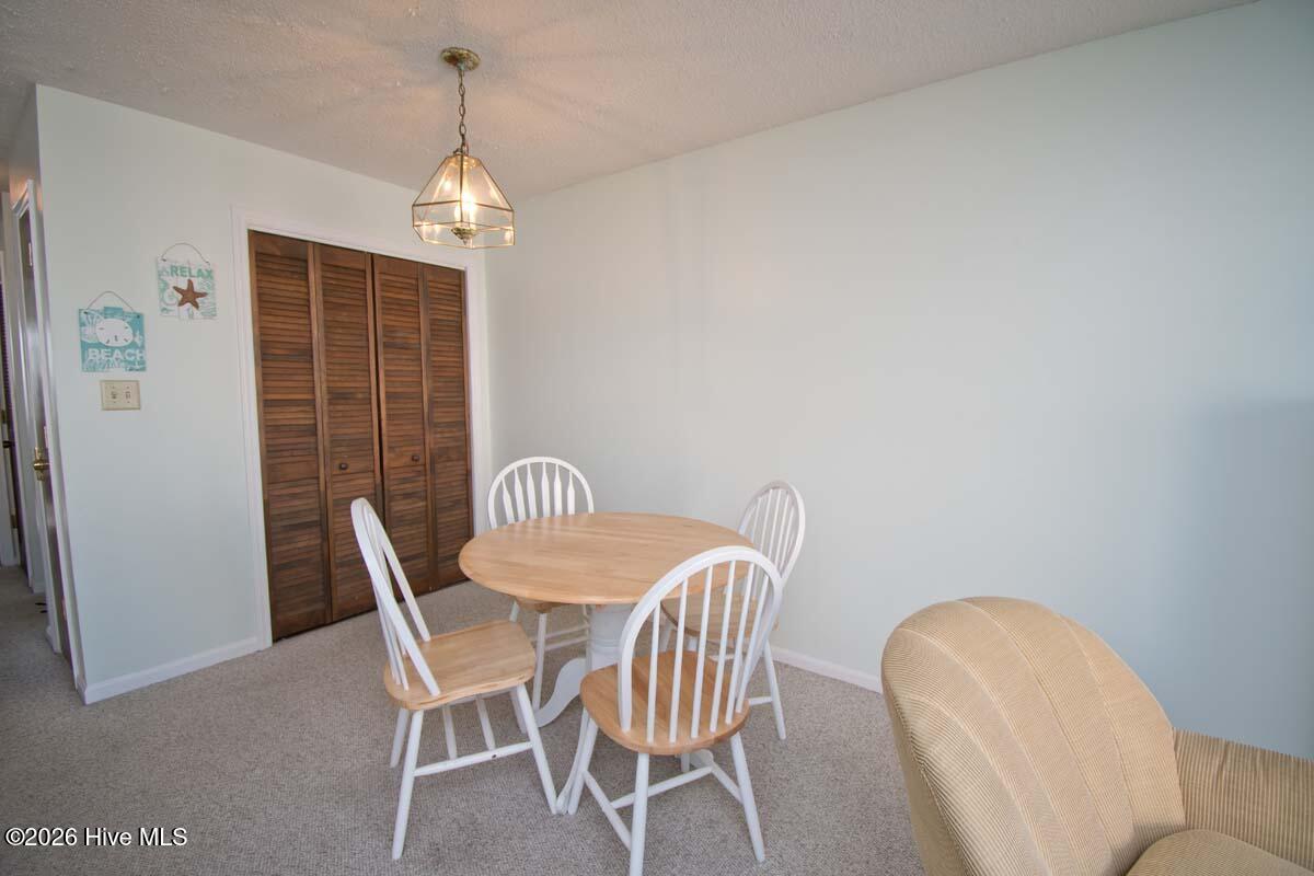 9201 Coast Guard Road, Unit F 210 Emerald Isle, NC 28594 - Photo 8 of 32 Dining