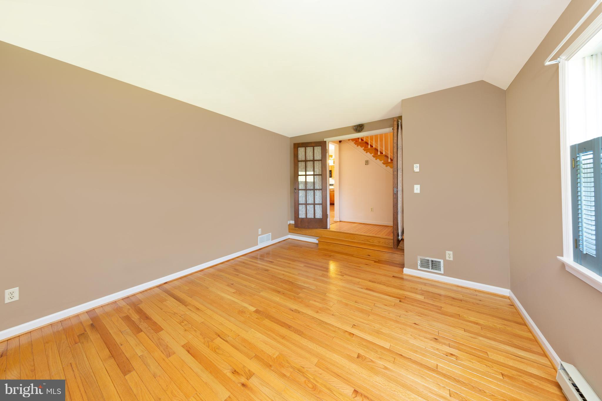 18257 Falls Road Hampstead, MD 21074 - Photo 11 of 49 a view of an empty room and window