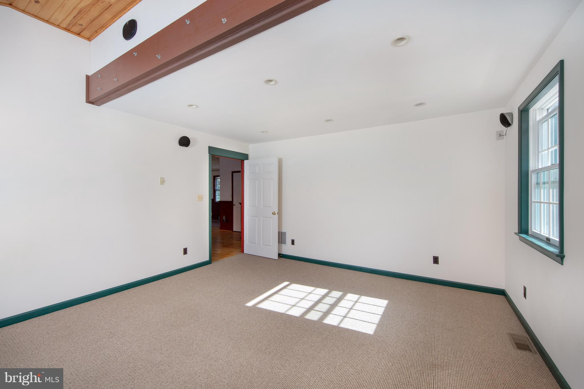 18257 Falls Road Hampstead, MD 21074 - Photo 32 of 49 a view of an empty room with a window