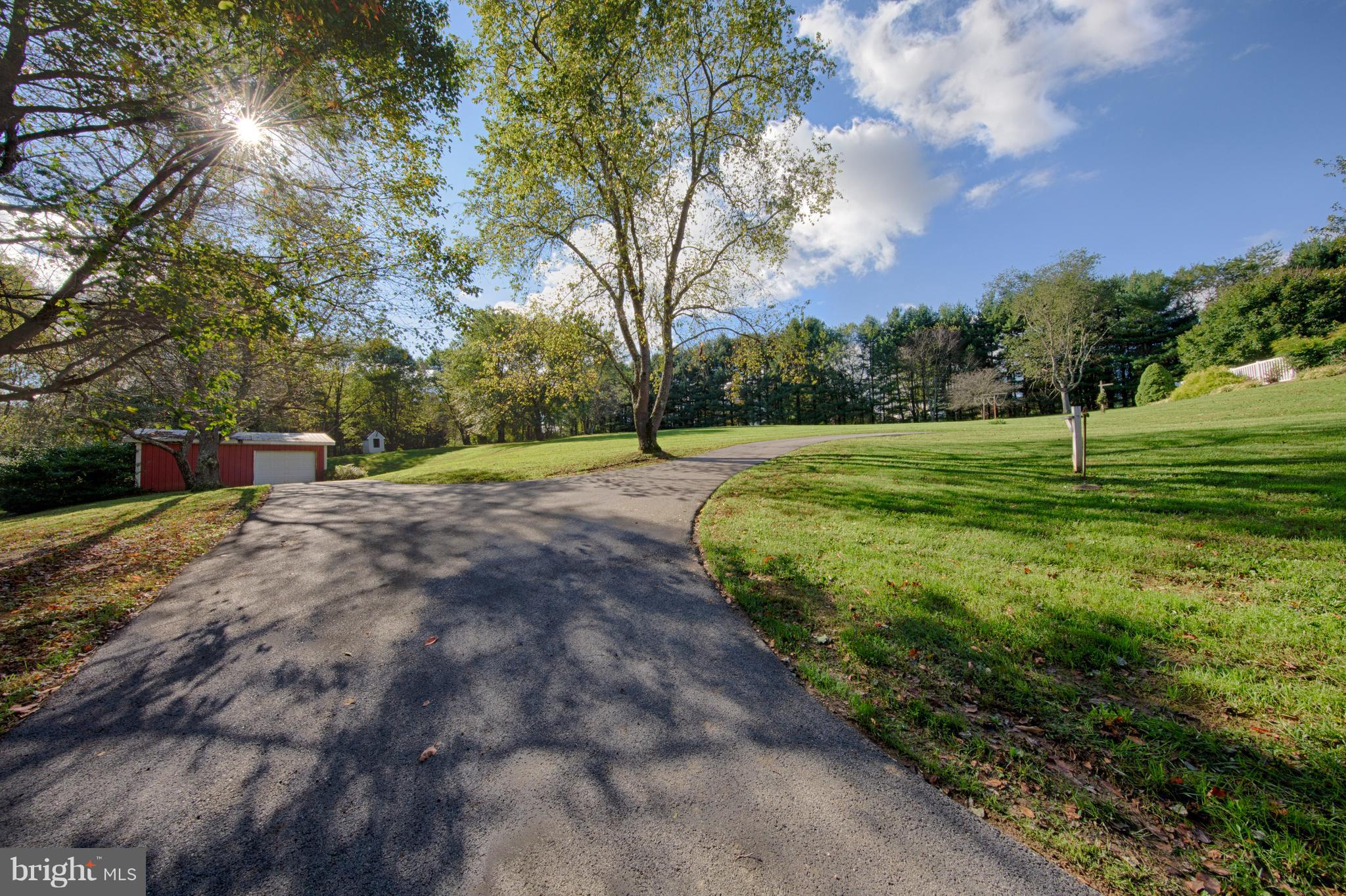 18257 Falls Road Hampstead, MD 21074 - Photo 40 of 49 a view of grassy field with trees