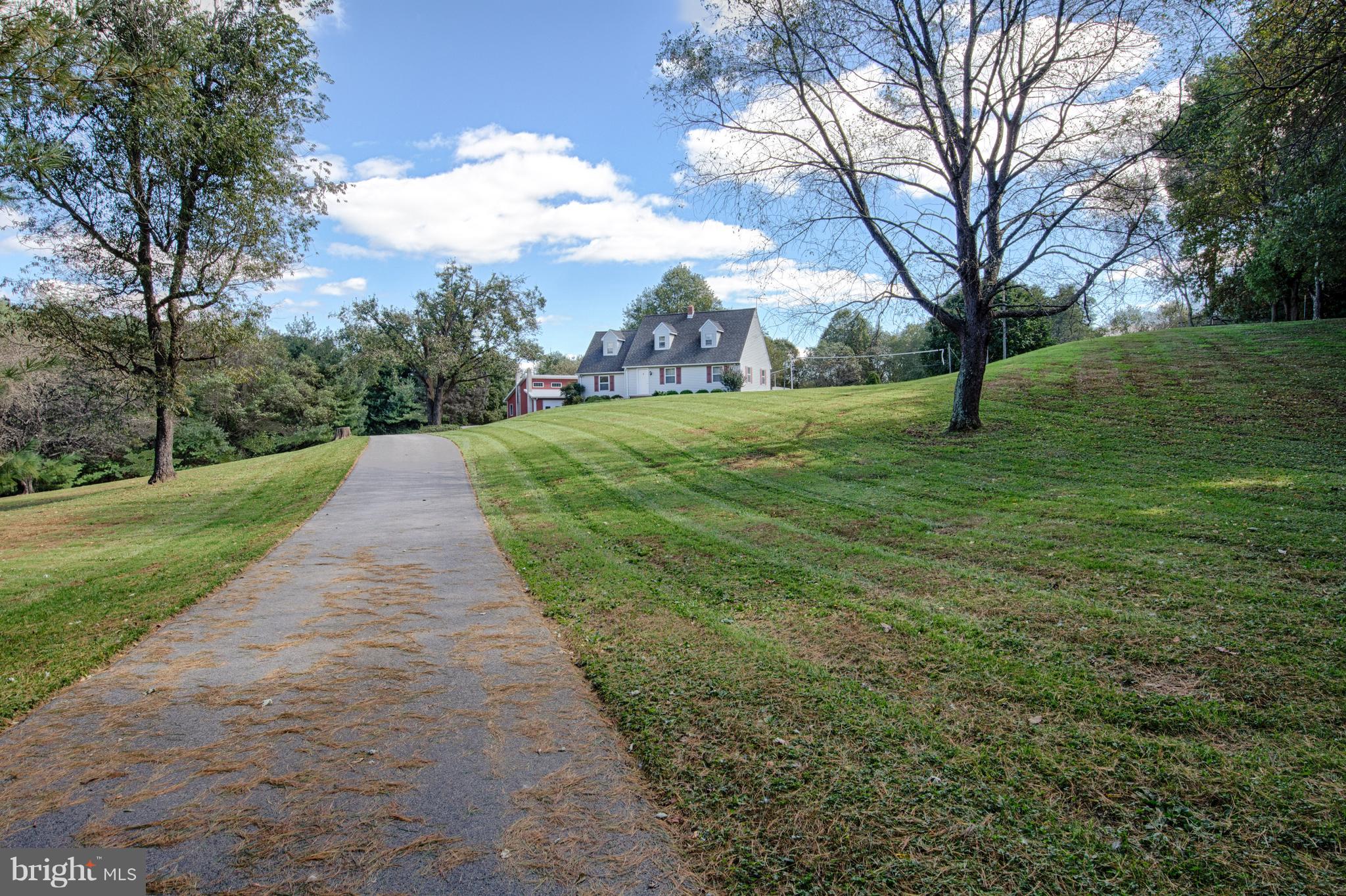 18257 Falls Road Hampstead, MD 21074 - Photo 41 of 49 a view of a park with large trees