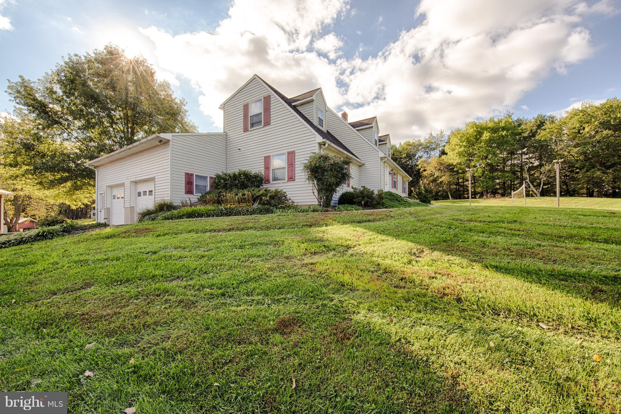 18257 Falls Road Hampstead, MD 21074 - Photo 43 of 49 a view of a house with a yard