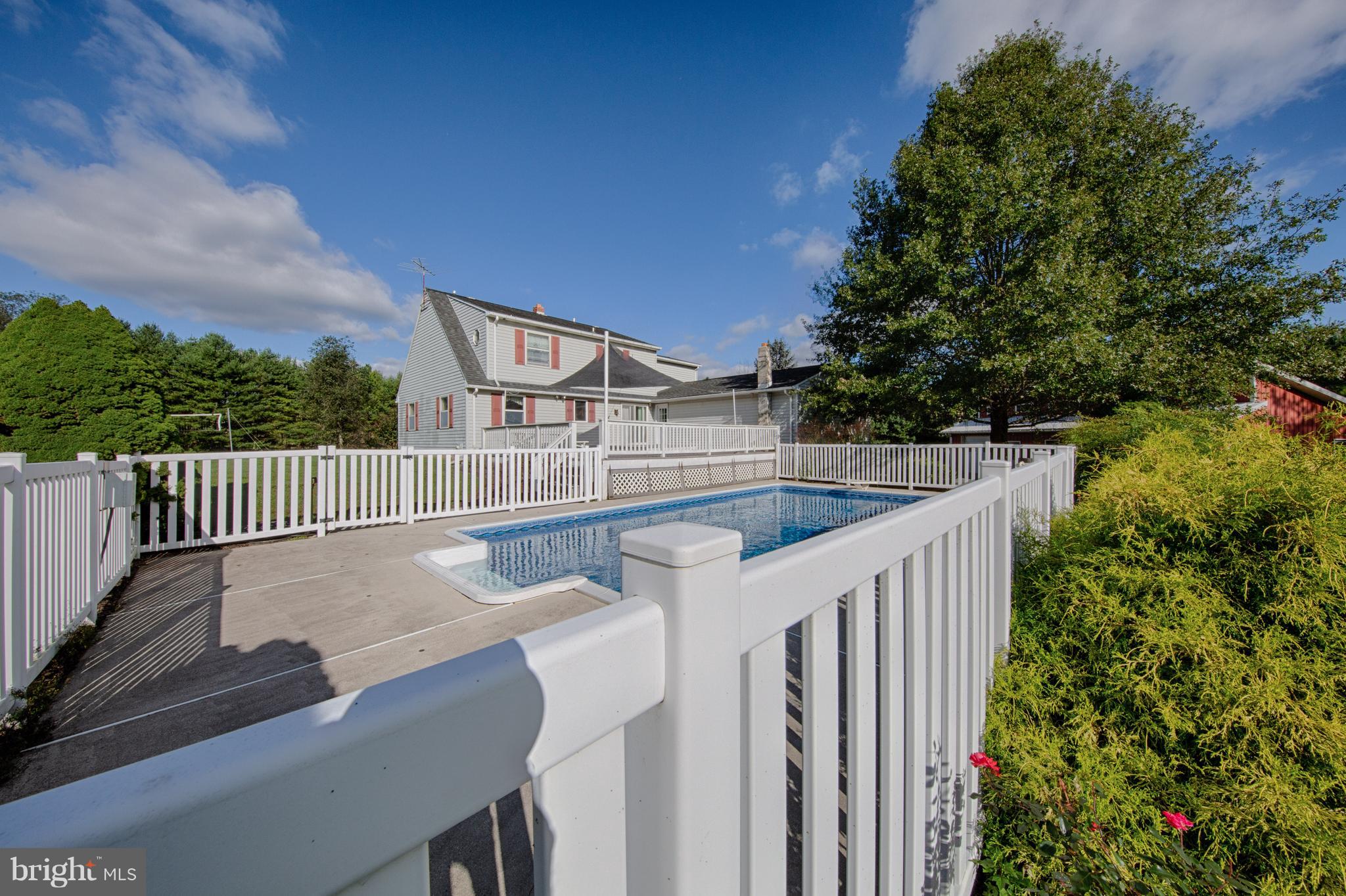 18257 Falls Road Hampstead, MD 21074 - Photo 47 of 49 a balcony with an outdoor space