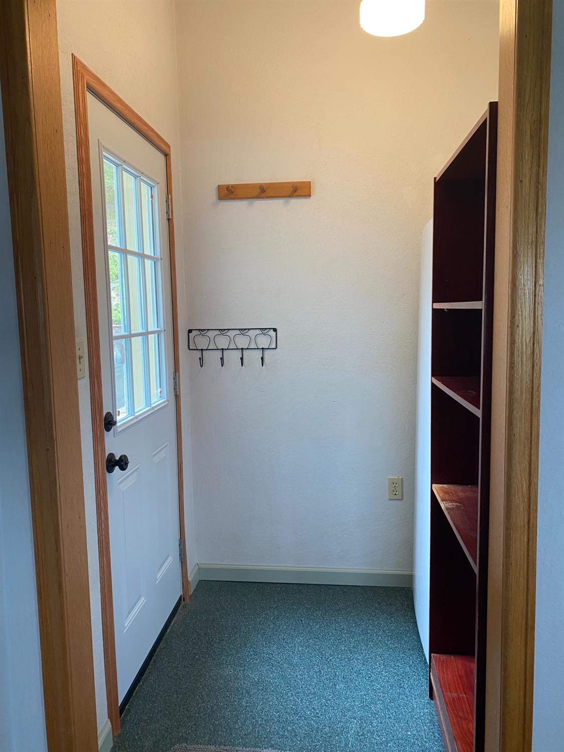 5021 Banbury Cross Road Shingle Springs, CA 95682 - Photo 28 of 92 Mud room with shelving to switch your shoes from outside to inside.