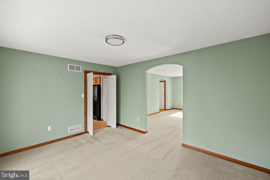 105 Round Top Lane Gettysburg, PA 17325 - Photo 14 of 50 an empty room with windows and closet