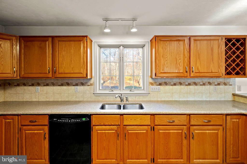 105 Round Top Lane Gettysburg, PA 17325 - Photo 18 of 50 a kitchen with stainless steel appliances granite countertop cabinets and a sink