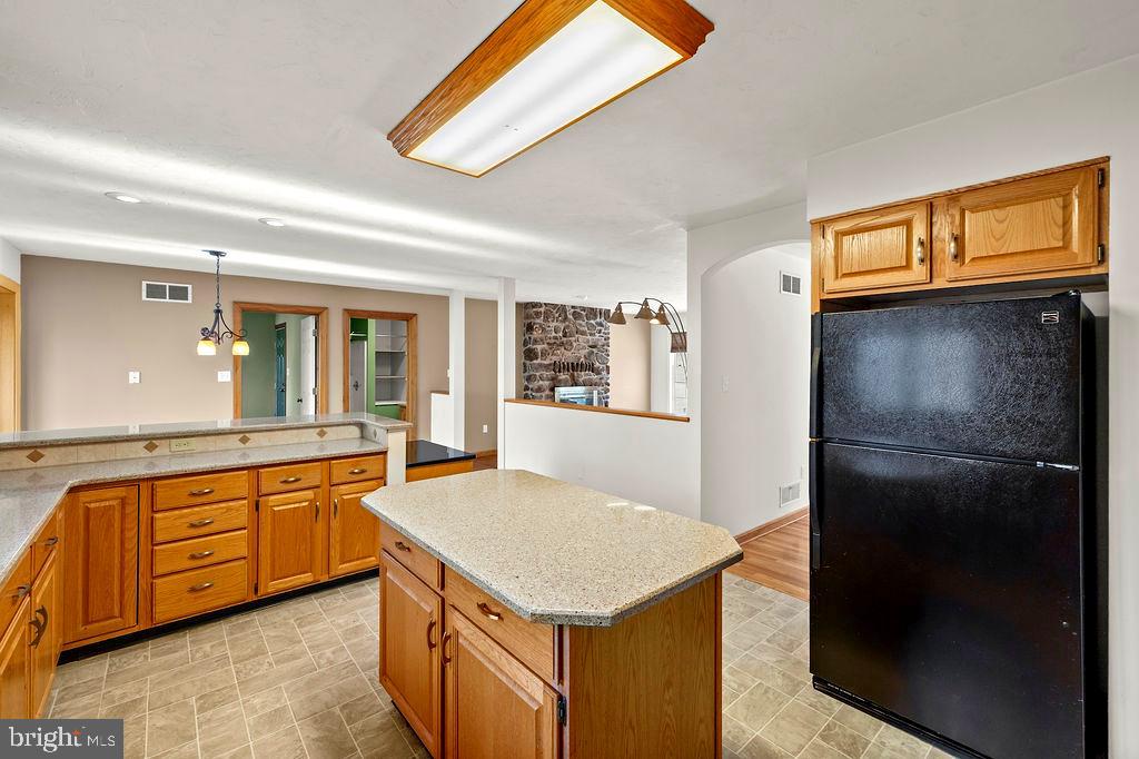 105 Round Top Lane Gettysburg, PA 17325 - Photo 19 of 50 a kitchen with a refrigerator and a sink