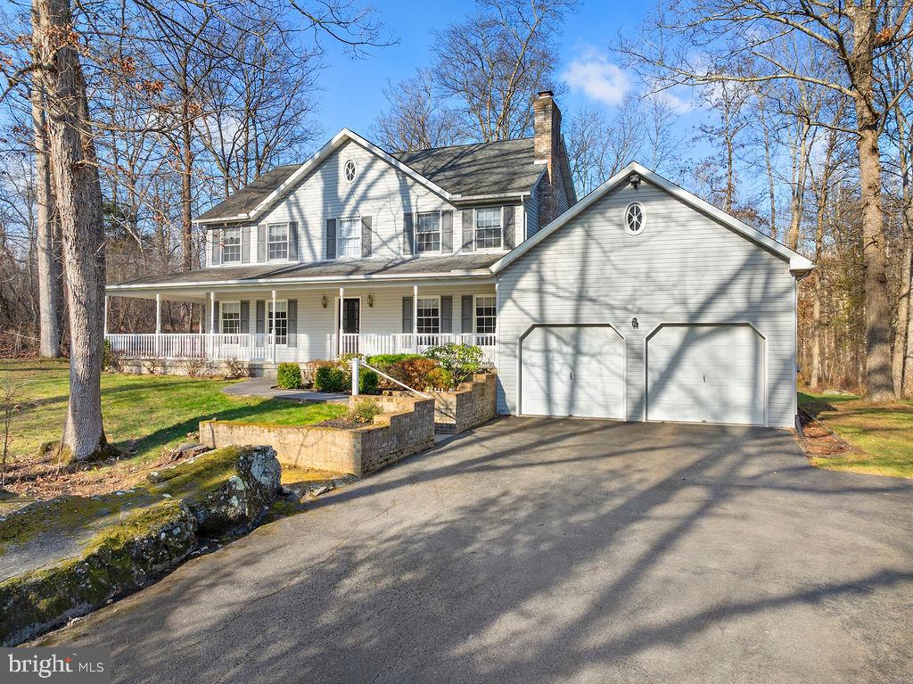 105 Round Top Lane Gettysburg, PA 17325 - Photo 2 of 50 a view of house with yard and sitting area