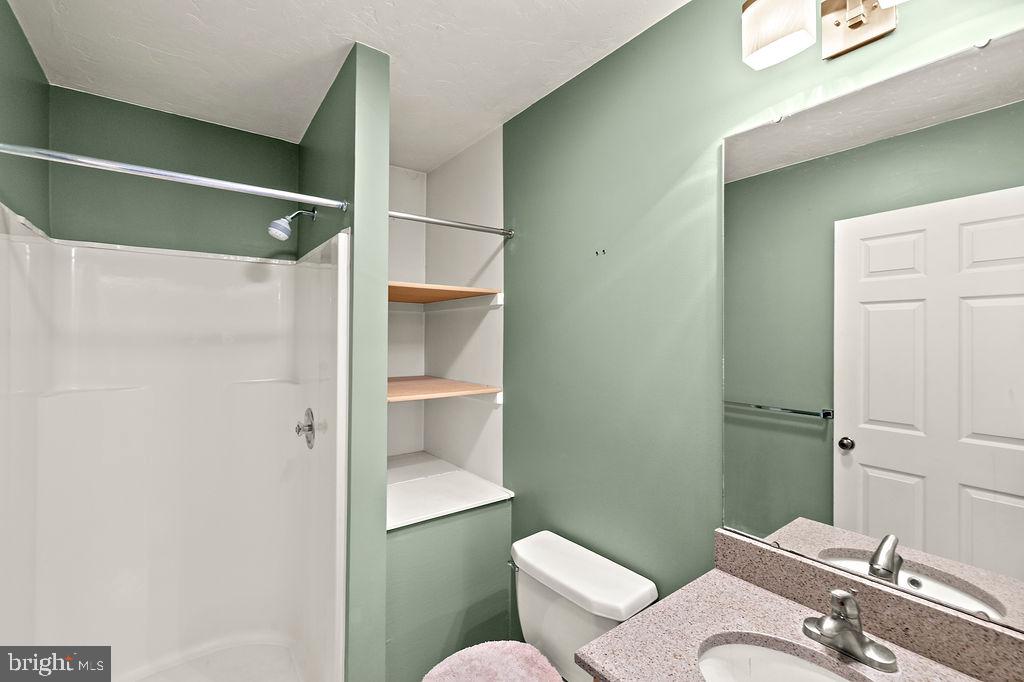 105 Round Top Lane Gettysburg, PA 17325 - Photo 23 of 50 a bathroom with a toilet and a shower