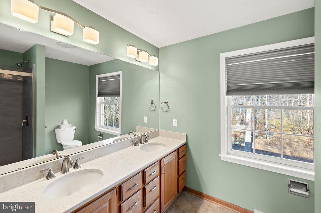 105 Round Top Lane Gettysburg, PA 17325 - Photo 32 of 50 a bathroom with a sink and a mirror