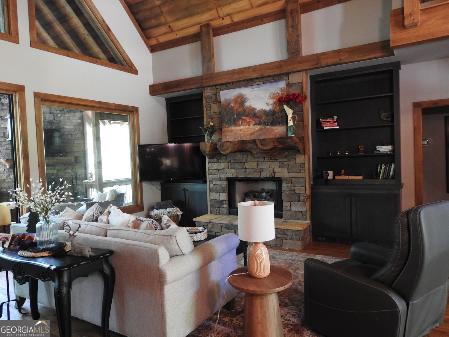 366 Shepherds Lane Morganton, GA 30560 - Photo 17 of 77 a living room with furniture a fireplace and a flat screen tv