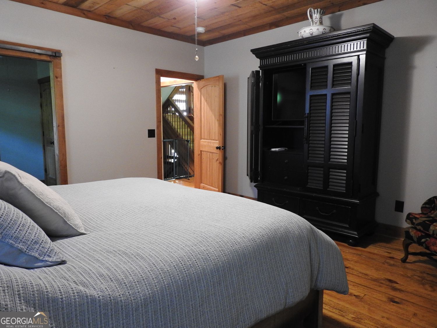 366 Shepherds Lane Morganton, GA 30560 - Photo 25 of 77 a bedroom with a bed and a dresser