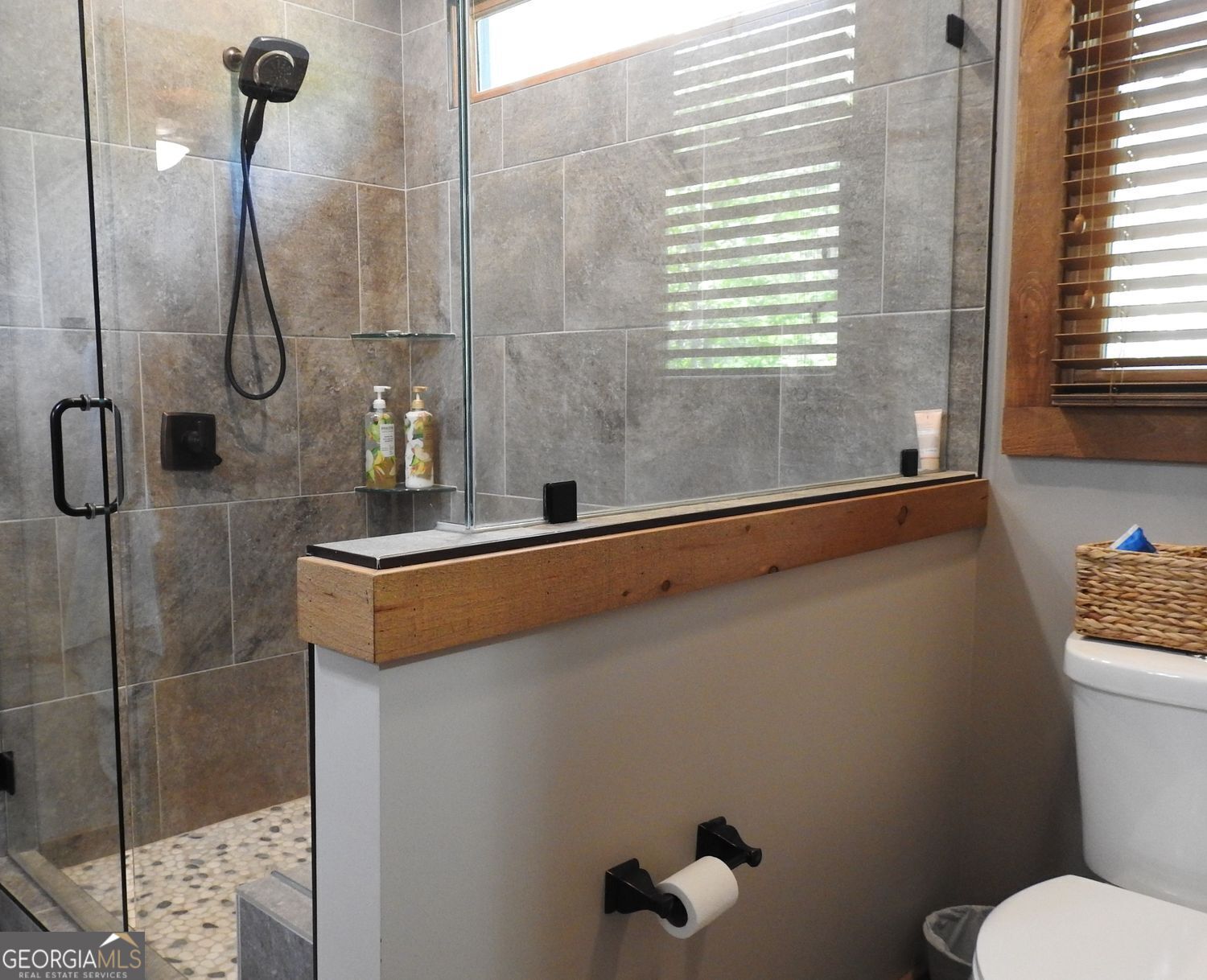 366 Shepherds Lane Morganton, GA 30560 - Photo 29 of 77 a bathroom with a shower and a toilet
