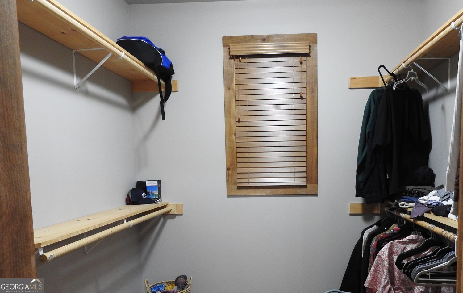 366 Shepherds Lane Morganton, GA 30560 - Photo 32 of 77 a view of walk in closet with clothes and shoes