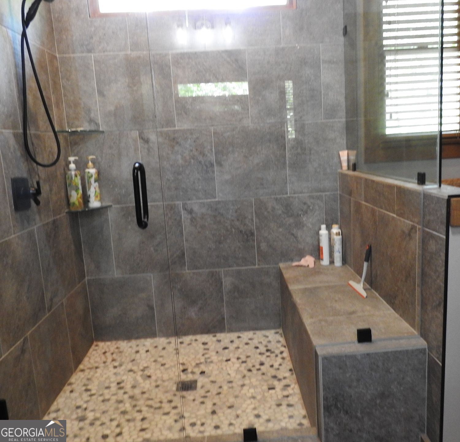 366 Shepherds Lane Morganton, GA 30560 - Photo 36 of 77 a bathroom with a sink and a shower