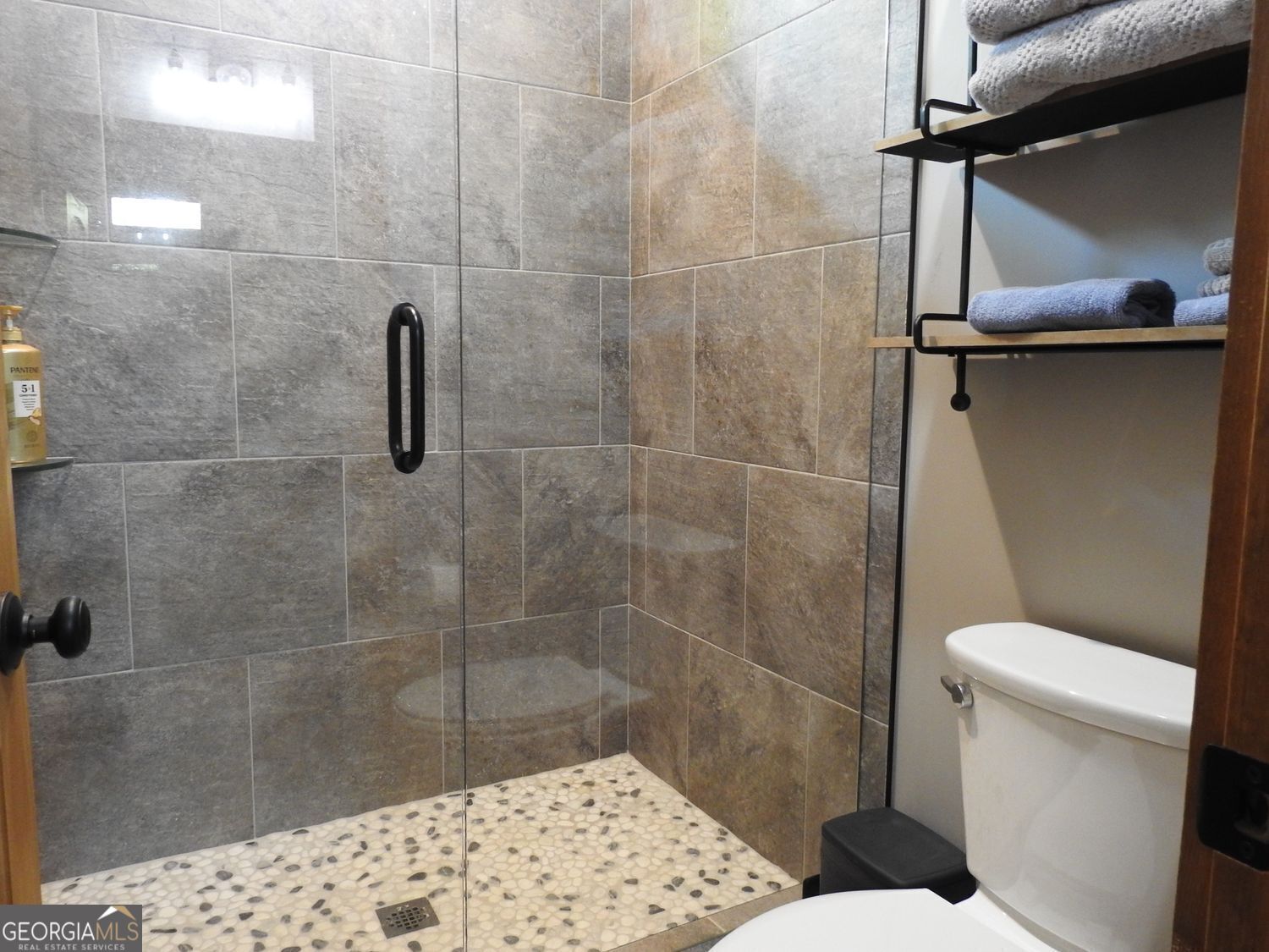 366 Shepherds Lane Morganton, GA 30560 - Photo 43 of 77 a bathroom with a toilet and a shower