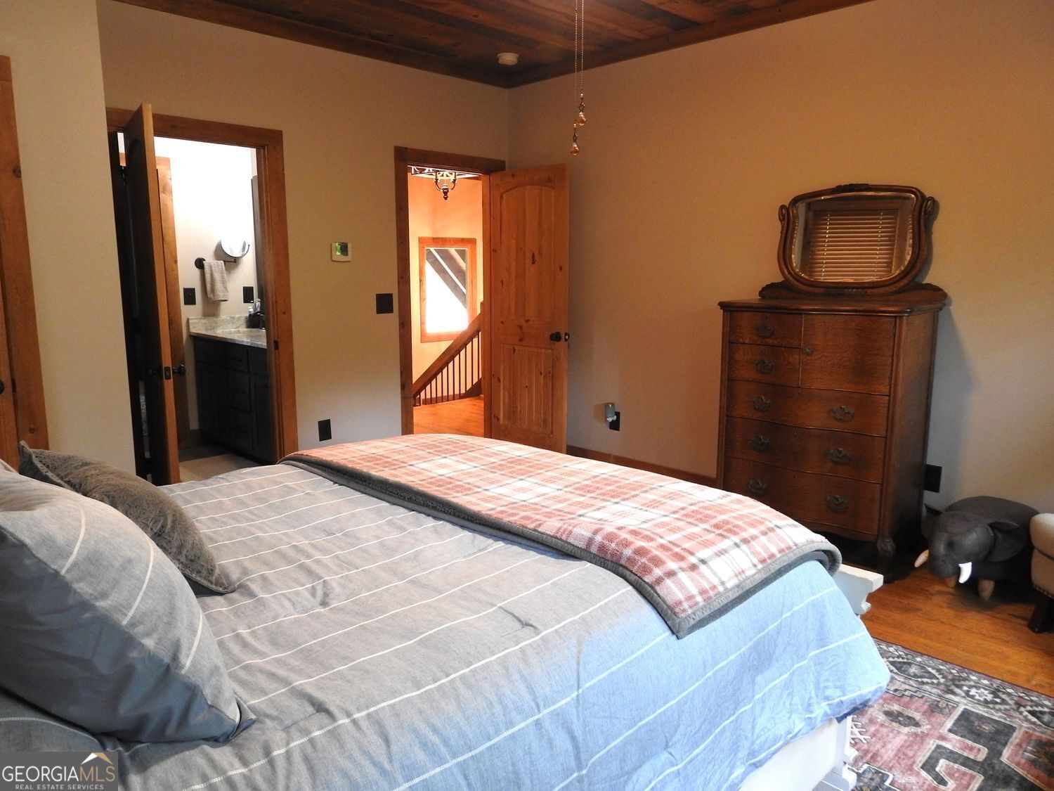 366 Shepherds Lane Morganton, GA 30560 - Photo 48 of 77 a bedroom with a bed and wooden floor